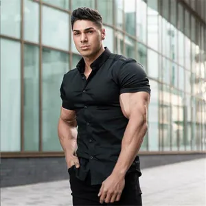 Detailed view of the professional muscle fit black short sleeve polo shirt for fitness
