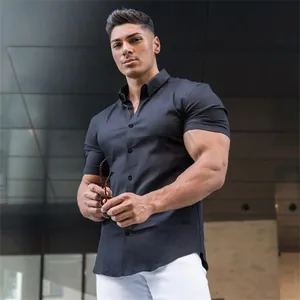 Premium muscular fit men's short sleeve stretch button-down dress shirt in black