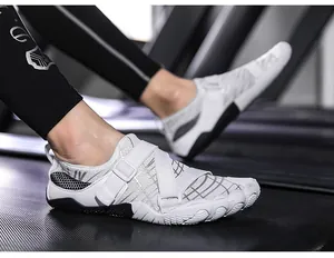 Close-up of white breathable wading shoes worn on a treadmill during a gym workout
