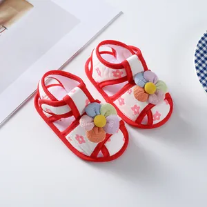 Close-up detail of baby girl summer walking shoes with soft sole and 3D flower accent