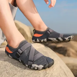 Unisex grey outdoor water shoes with cross-straps and camouflage non-slip rubber sole