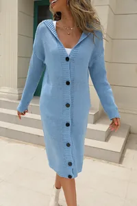 Detailed view of a stylish long light blue hooded knit cardigan with black buttons