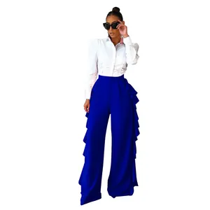 Elegantes pantalones de talle alto azul real para mujer con detalles de volantes