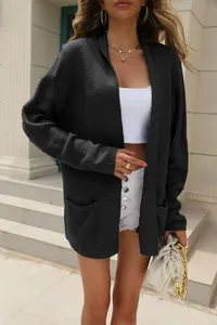 Close-up of charcoal grey long-sleeved knitted cardigan with open front and pockets.