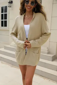 Women's beige loose knitted cardigan with pockets for fall winter fashion look