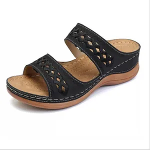 Elegant black wedge sandals for women with intricate embroidered cutout design straps