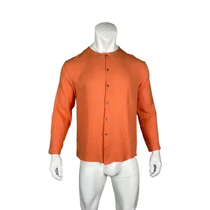 Macro detail showing the unique orange crinkle texture of this men's casual shirt.