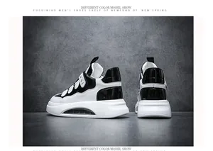 Detailansicht der schwarz-weißen High-Top-Sneaker mit Klettverschluss und Luftpolstersohle