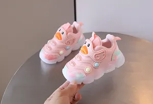 Toddler girl's pink cartoon duck sneakers with breathable mesh and soft sole for walking