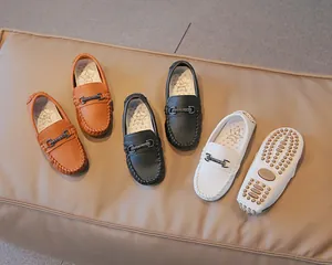 Kids' British style leather loafers in orange, black, and white with non-slip soles