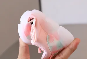 Close-up showing the extreme flexibility of the soft sole toddler walking shoes