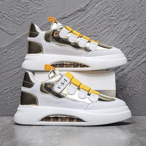 Detailansicht weißer und goldener High-Top-Sneaker mit Luftkissen und Klettverschluss