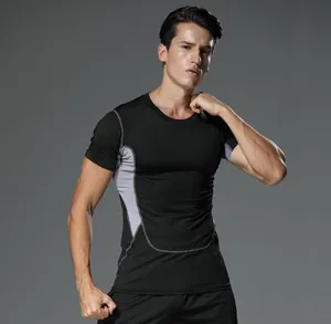 Detail view of men's quick-dry compression gym T-shirt featuring grey mesh side panels