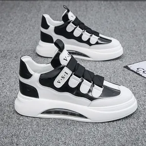 Modische schwarz-weiße High-Top-Sneaker mit Klettverschluss und Luftpolster-Plateau