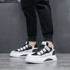 Modische schwarz-weiße Color-Block-Sneaker mit dicken Sohlen und Luftpolsterdämpfung