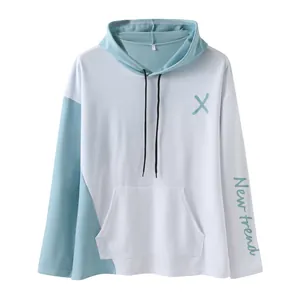 Close-up of stylish color-block hooded sweatshirt featuring 'New trend' sleeve print