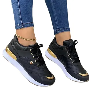Stylish women's black casual running shoes with gold heart detail and quilted pattern