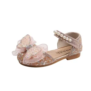 Sparkling girl's princess dress shoes featuring large butterfly bow and rhinestones