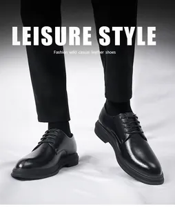 Close-up detail of stylish black leather formal business shoes for men on white background