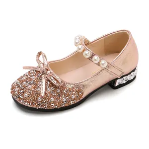 Elegant rose gold girls' princess dress shoes with bow tie and faux pearl strap for party