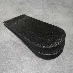 Vue détaillée de la talonnette noire texture cuir montrant le profil mince amortissant