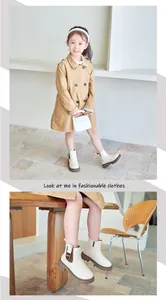 Detail of cream children's Martin boots with thick soles and stylish British design