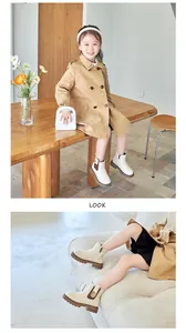 Detailed view of child model wearing cream-colored British style thick-soled boots