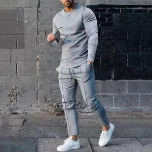 Detailed view of men's grey long sleeve casual tracksuit with drawstring trousers.