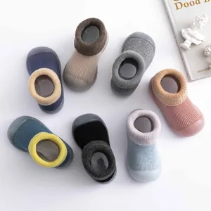Assortment of baby winter sock shoes featuring warm lamb wool cuffs and non-slip soft soles