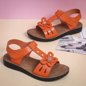 Vibrant orange children's summer sandals with decorative flowers and non-slip soft soles