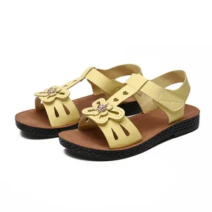 Comfortable yellow children's summer sandals with flower detail and soft non-slip sole