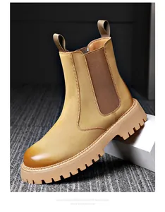Side detail view of men's genuine tan leather Chelsea boots featuring a thick lug sole