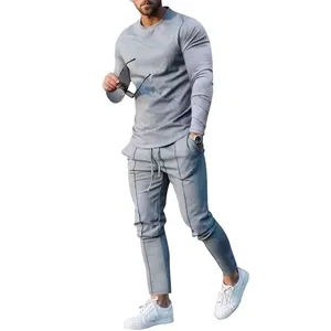 Slim fit men's grey long sleeve T-shirt and matching trousers two-piece athletic set