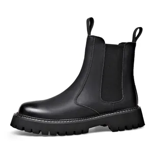 Classic men's black leather Chelsea boots with thick lug sole and elastic side panels
