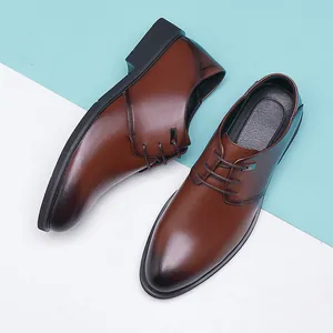 Elegant brown leather lace-up dress shoes for men suitable for business and formal occasions