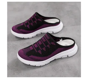 Close-up of purple fly-knit slip-on sneakers with breathable mesh and white sole.