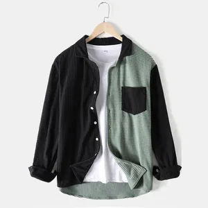 Detail of color block corduroy shirt jacket for men with chest pocket and waffle texture