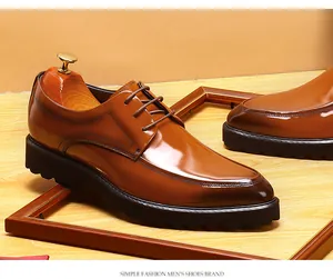 Detailed view of glossy brown leather men's derby shoes with thick black platform soles.