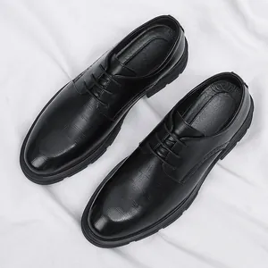 Men's black business formal dress shoes with hidden height increase on white background