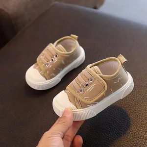 Zapatos de lona caqui transpirables para bebés con suelas blancas antideslizantes y velcro