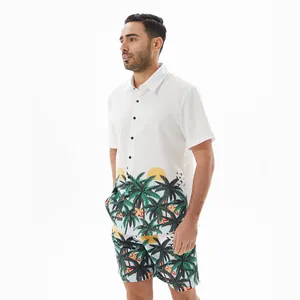 Mens white Hawaiian shirt and shorts set featuring vibrant tropical palm tree print