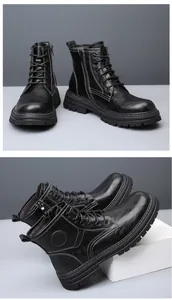 Gros plan de bottines en cuir noir avec fermeture éclair et coutures contrastées.