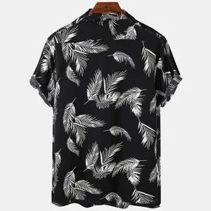 Back view of a black Hawaiian shirt with white palm leaf print and lapel collar