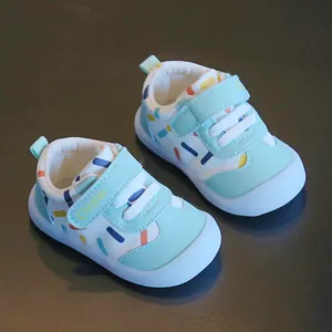 Close-up detail of breathable leather baby walking shoes with colorful sprinkles pattern