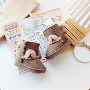 Detailed view of brown baby snow boots featuring cute fleece ears and soft warm lining