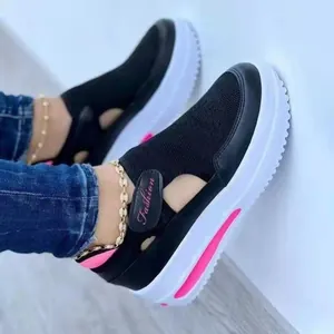 Nahaufnahme von Damen-Fly-Knit-Plateauschuhen mit Klettverschluss und Hohlmuster