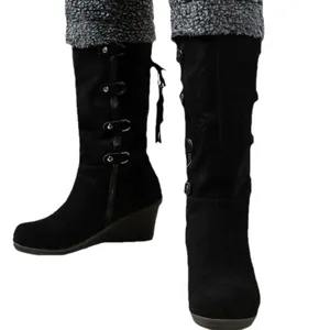 Women's elegant black suede wedge high-top boots with tassels and side buckle details