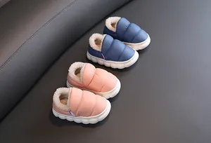 Waterproof children's winter boots in pink and blue with warm white fleece lining