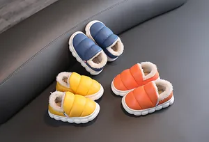 Colorful waterproof winter slippers for kids with thick fleece lining and white soles