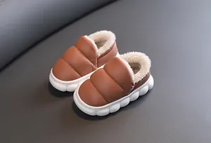 Warm brown children's winter snow boots with soft plush lining and thick non-slip sole